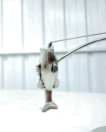 🎣Die balancierende Skulptur des Fischer