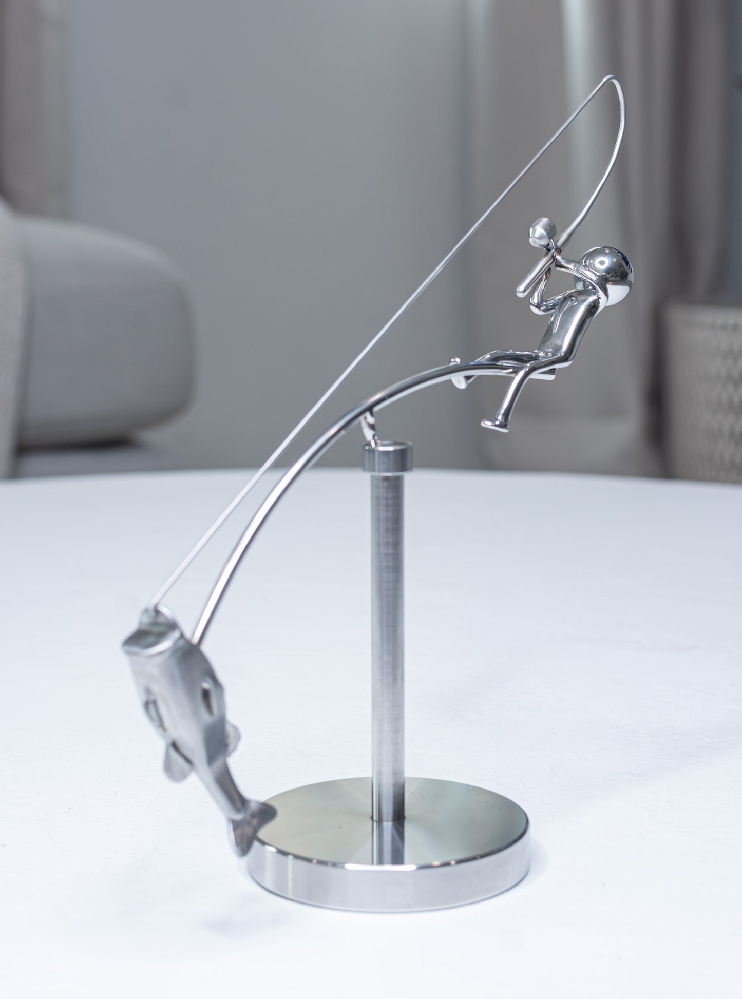 🎣Die balancierende Skulptur des Fischer